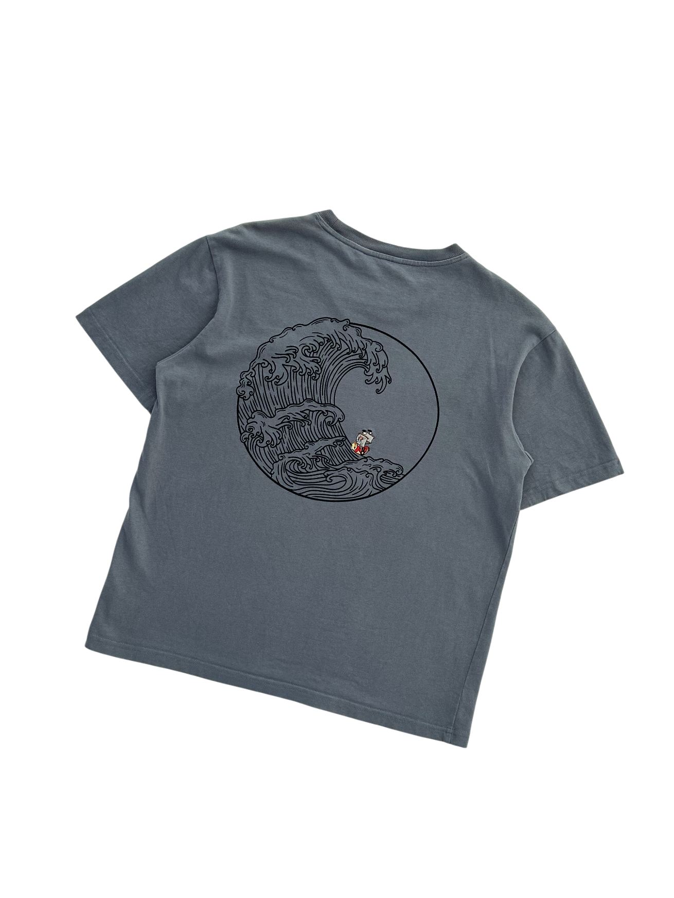 A dark gray short-sleeve t-shirt with a circular black line art graphic of a wave and a small red-orange ship, displayed on a clean white background.